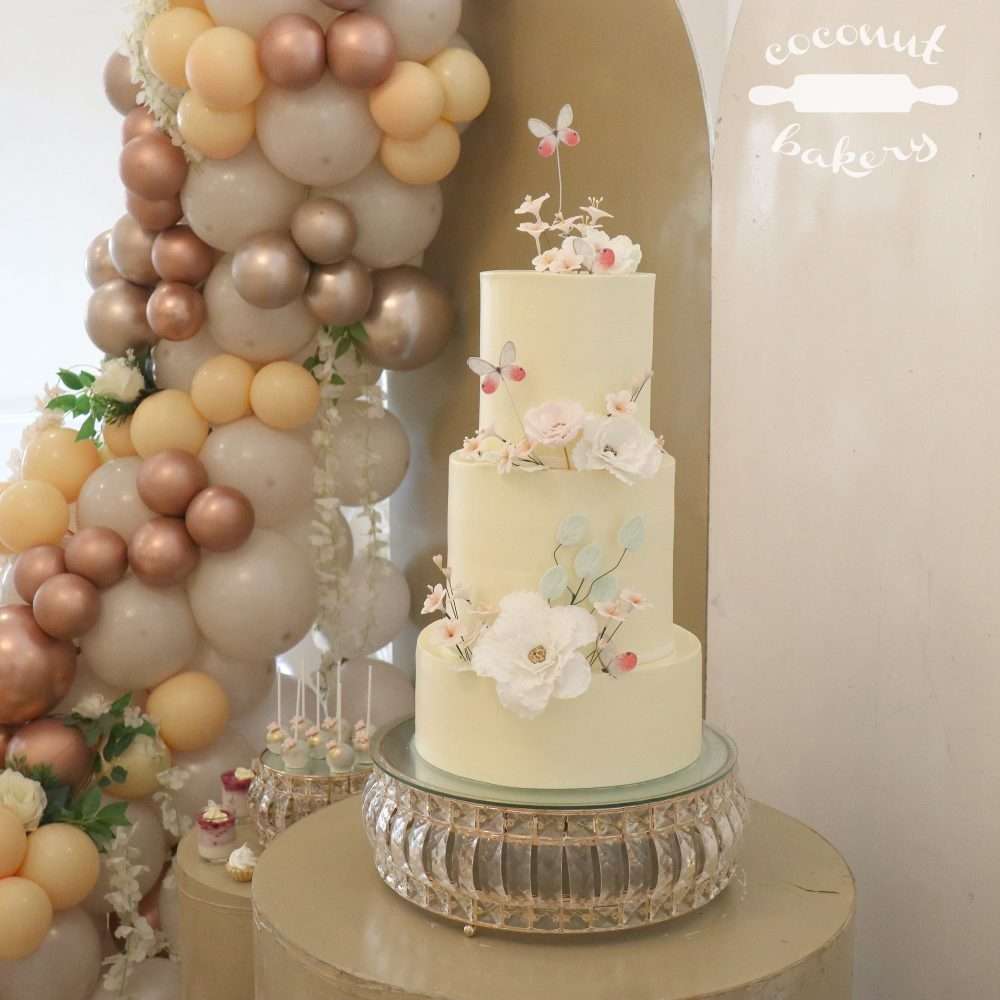 Torta y mesa dulce en tonos rosa para el bautizo y primer año de Emilia